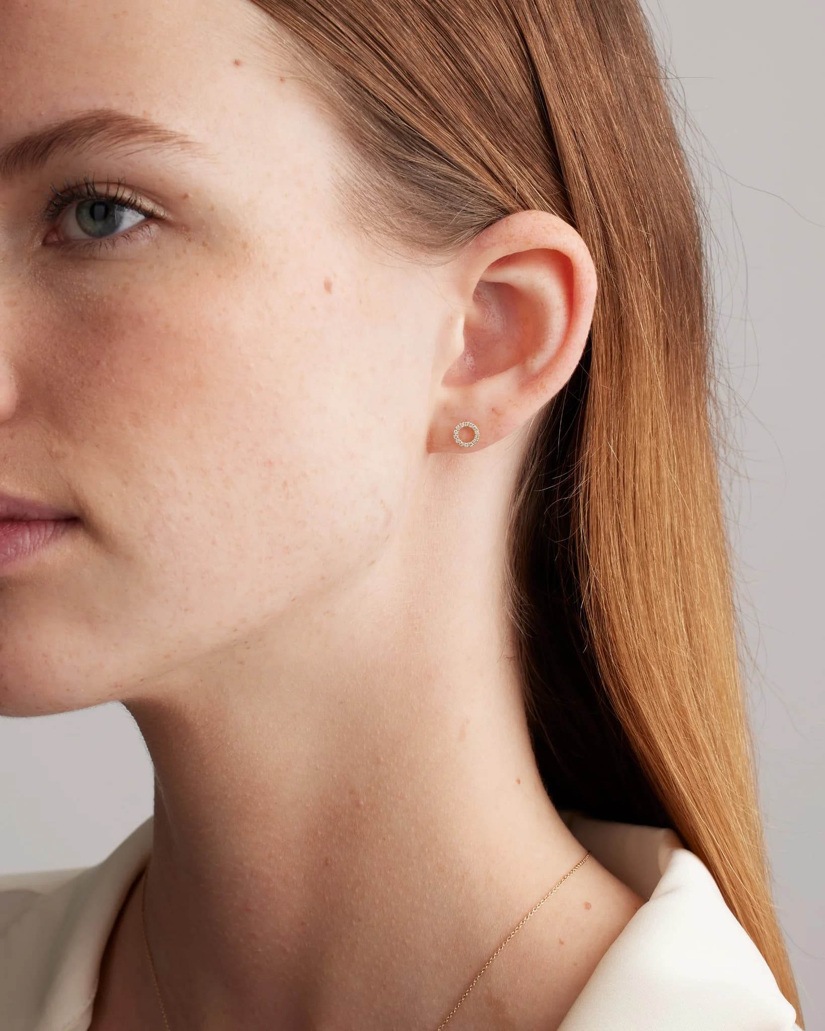 Delicate Circle Stud Earring — Model In-Use Shot