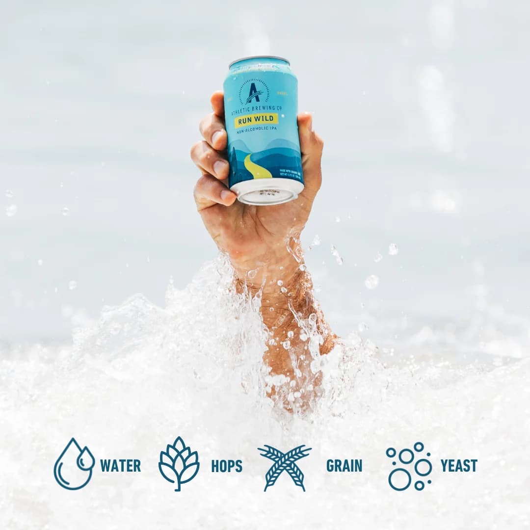 Athletic Brewing Co. — Hand Holding Can in Water