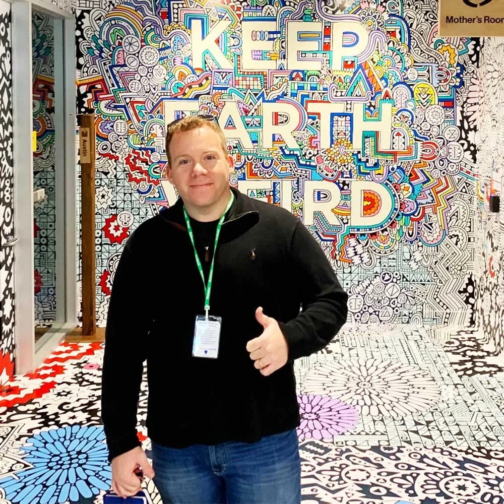 Man with Thumbs Up — Vibrant Mural Lifestyle