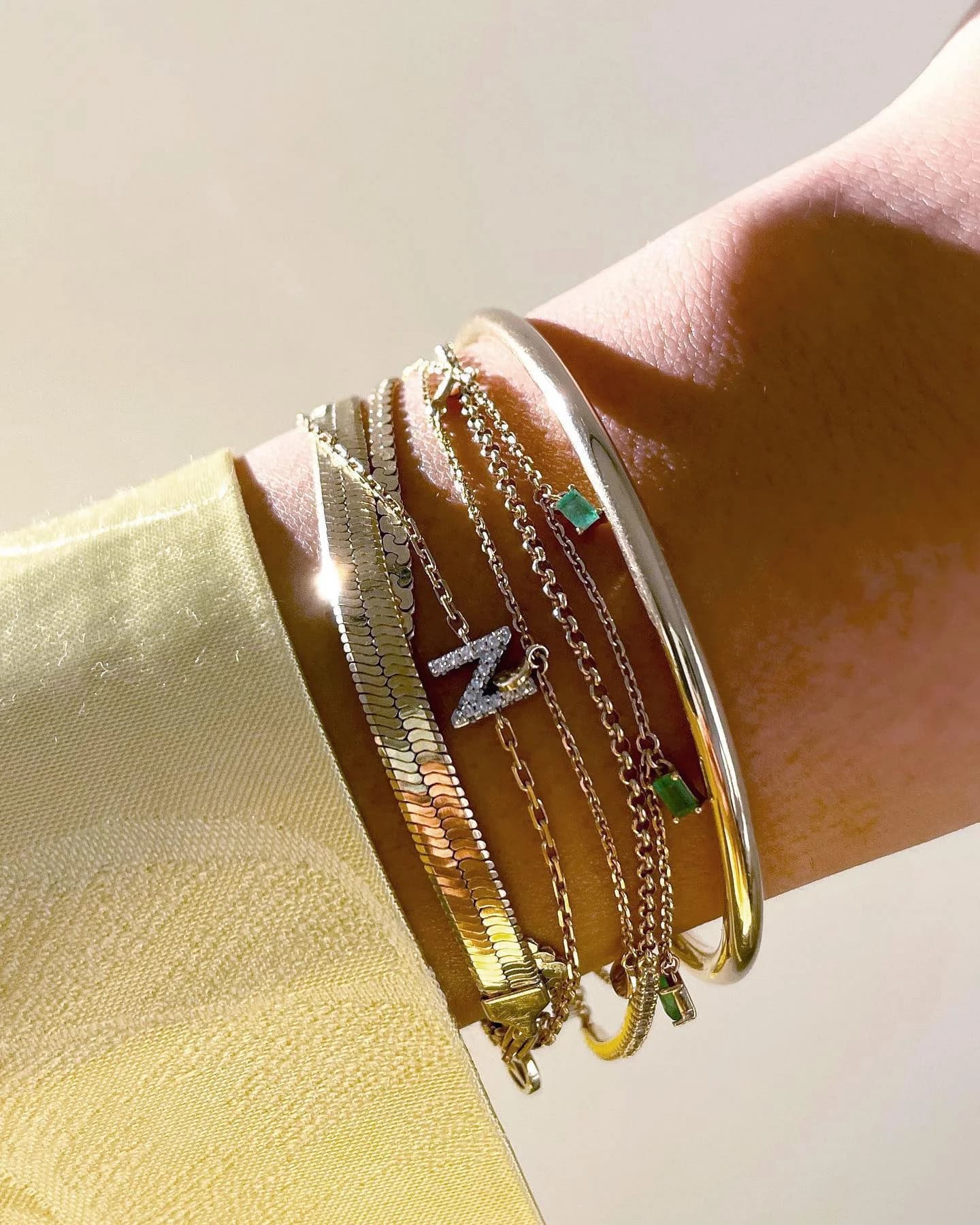 Layered Gold Bracelets — In-Use Close-Up