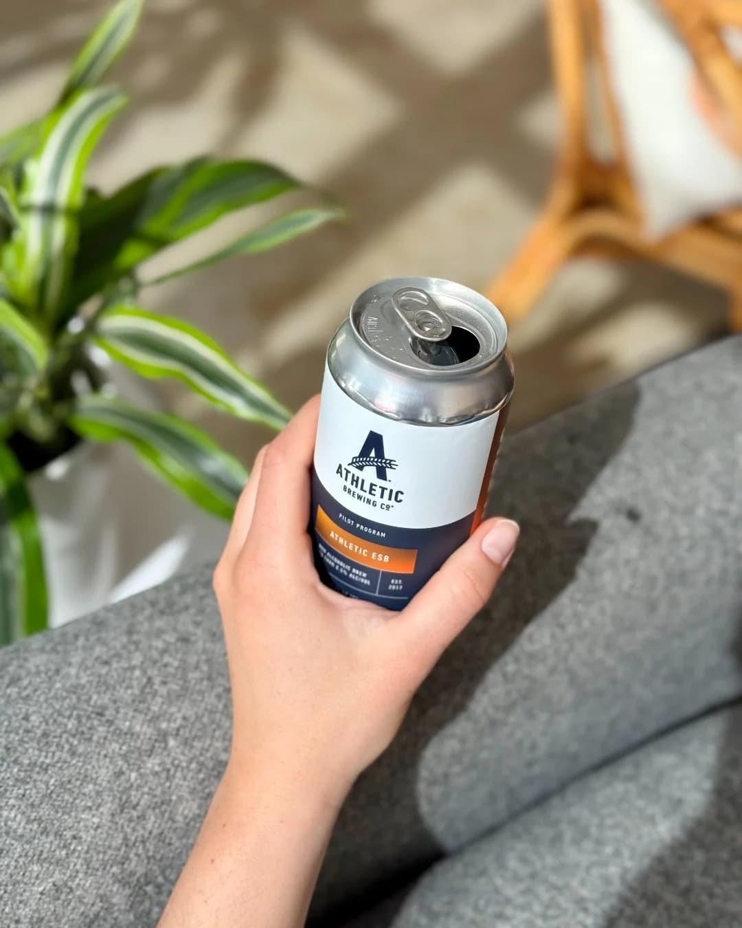 Athletic Brewing Co. — Casual Hand-Held Lifestyle