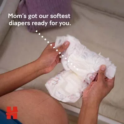 Huggies family ad example using baby-voice diaper copy from the Meta Ad Library