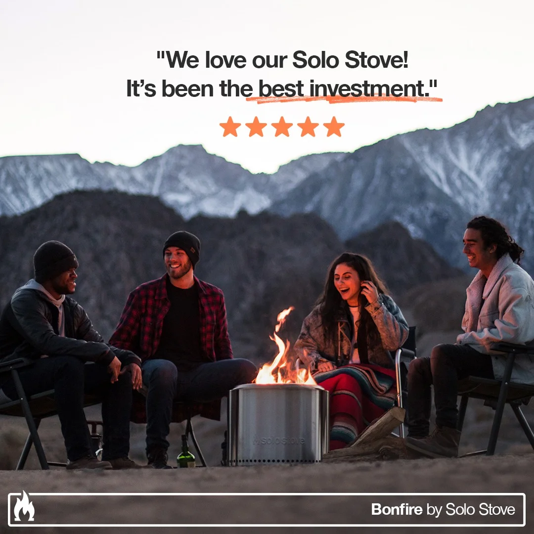 Solo Stove fire pit lifestyle static ad with friends gathered and a five-star testimonial