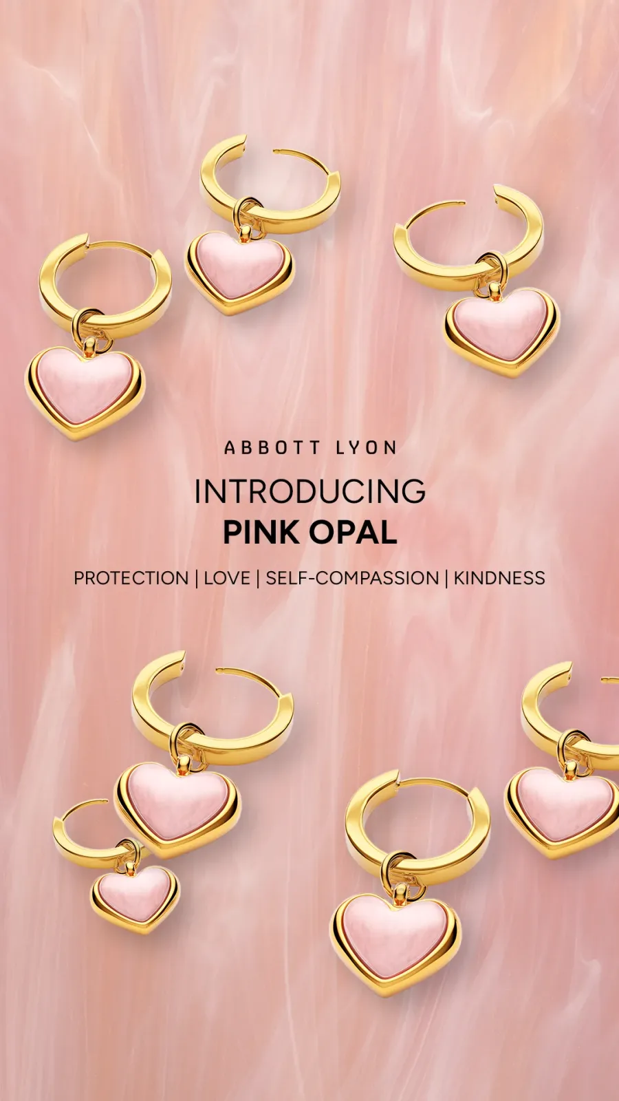 Abbott Lyon jewelry ad: six gold hoop earrings with pink opal heart charms scattered on pink marble, "Introducing Pink Opal"