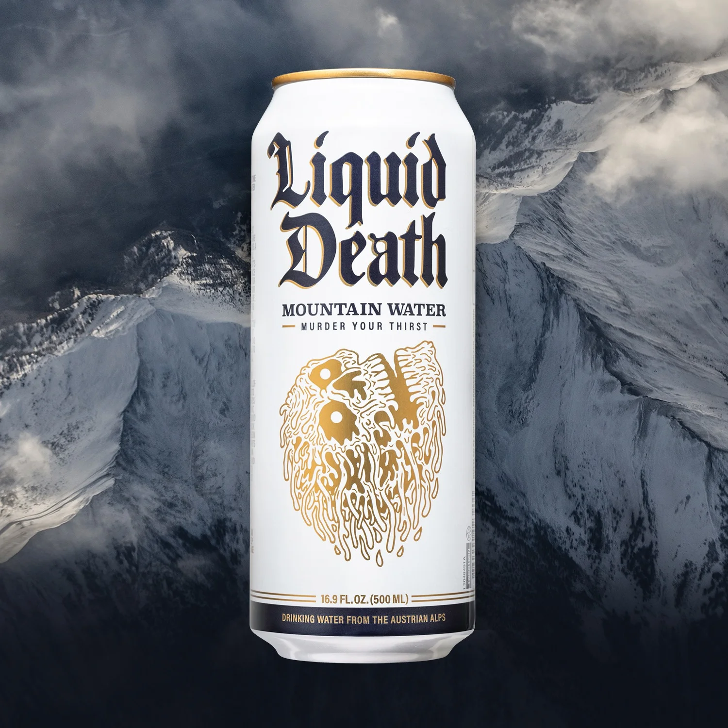 Liquid Death static ad — Mountain Water can centered on snow-capped Austrian Alps backdrop, gothic blackletter wordmark stacked vertically, "MURDER YOUR THIRST" tagline, gold drip-skull illustration on white can. The single longest-running ad in the dataset at 1,747 days.