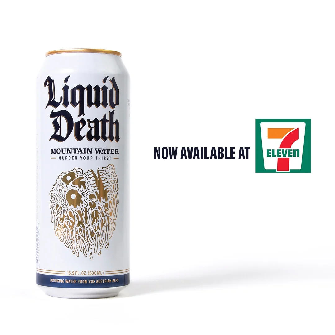 Liquid Death static ad — Mountain Water can on left, "NOW AVAILABLE AT 7-Eleven" copy in the center-right, 7-Eleven logo on the right, plain white background. The longest-running format in Liquid Death's static ad library.