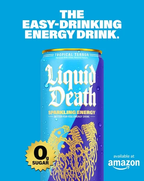 Liquid Death static ad — sky blue full-bleed background (the only ad in the set that isn't black or white) with bold white headline "THE EASY-DRINKING ENERGY DRINK" above the Sparkling Energy Tropical Terror can in blue and gold. A "0g SUGAR" gold starburst badge in the bottom-left, "Available at Amazon" callout bottom-right.
