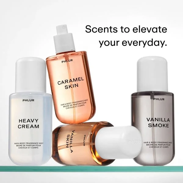 PHLUR luxury ad example: four translucent fragrance mists on a glass shelf, one lying down