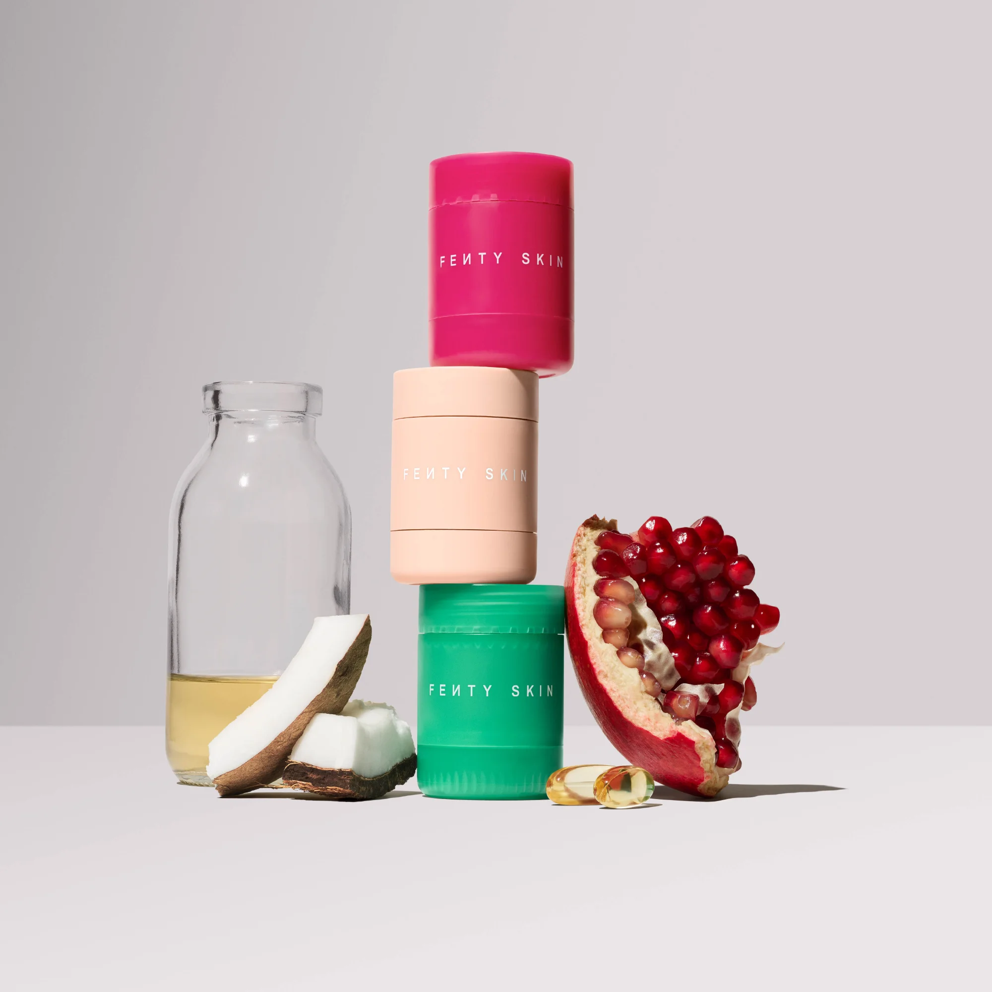 Fenty Skin stacked product containers with natural ingredients skincare ad